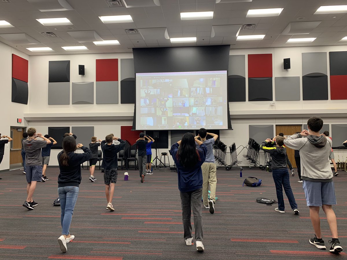 CoppellB's tweet photo. Teaching #2020 style! In-person and Virtual. There have been moments of awkward, sadness, but also joy as we continue to “march” forward into an ever changing year. I’m so proud of our 176 JV band kiddos as they embark on the most interesting season yet! https://t.co/9QBbqbHIcD
