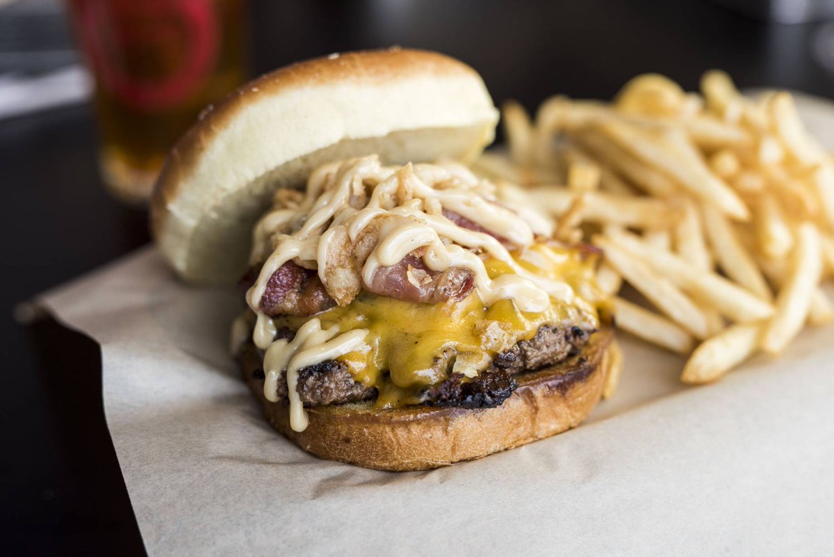 mrbrewsop's tweet photo. This tantalizing crowd-pleaser adds cheddar cheese crowned with grilled onions, two slices of bacon, crispy French fried onions, and topped off with Mr. Brew's signature sauce - Kentucky Bourbon mayo! https://t.co/x9EebQCurQ