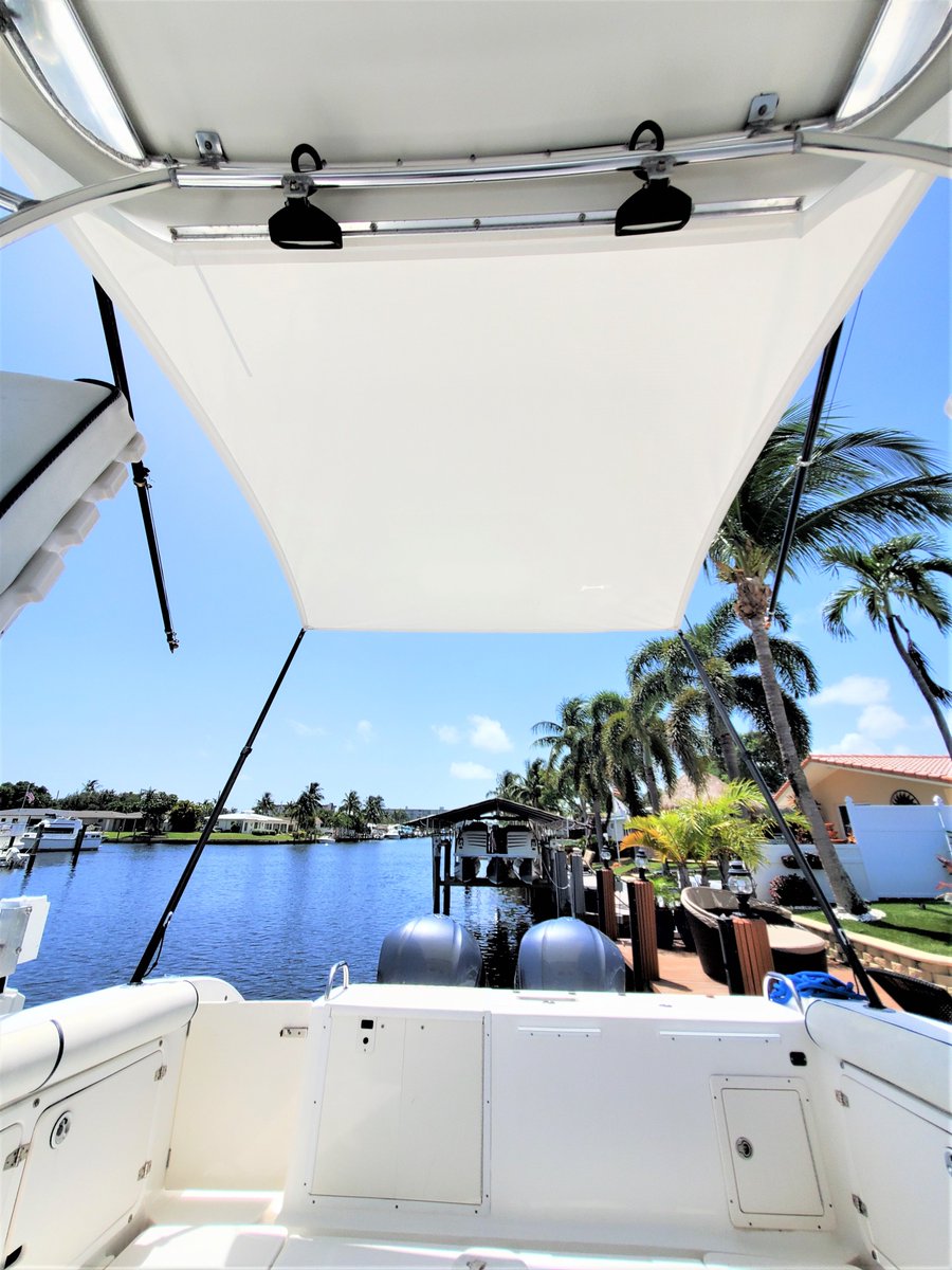 bluewatercanvas's tweet photo. ⚓ We made this aft shade in white Stamoid with 2 black adjustable carbon fiber poles on a 2004 Century 3200.  Impeccable job and very easy to put on and take off. https://t.co/Gr6zB6HiQc