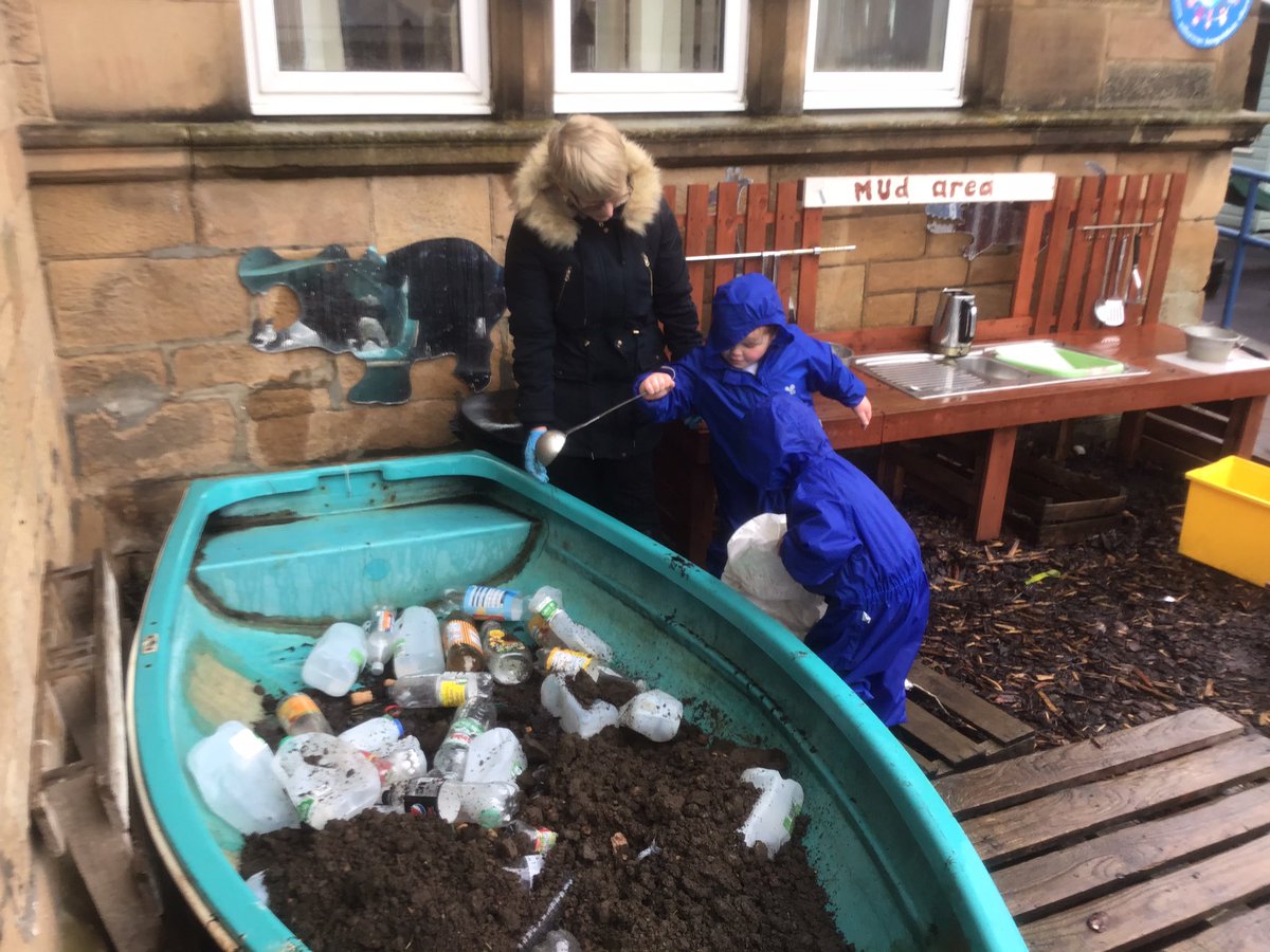 AirthNursery's tweet photo. We are filling up our boat to develop a planting area. Thanks to Mrs Davidson who kindly donated soil and plants to get us started. I had 2 willing helpers to help in the rain. #improvements #keentohelp @airthprimary https://t.co/NmGF1RSxl6
