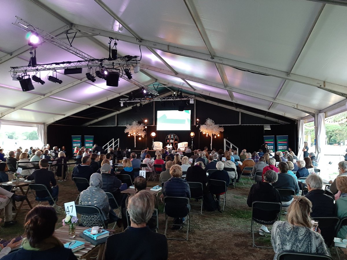Wimbookfest's tweet photo. Our socially distanced marquee is filling up for our first event! Only a few minutes until Andy Hamilton takes to the stage to discuss his new book 'Longhand' https://t.co/IVkNK8L2qW