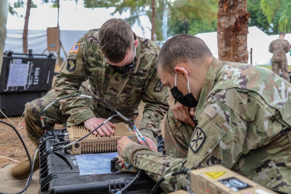 USPACOM's tweet photo. Soldiers from @USARPAC 307th Expeditionary Signal Battalion set up a Transportable Tactical Command Communication Station on Anguar, Palau during exercise #DefenderPacific20. #ArmyStrong #COMMS #FreeandOpenIndoPacific. https://t.co/TfkwwYlBnR