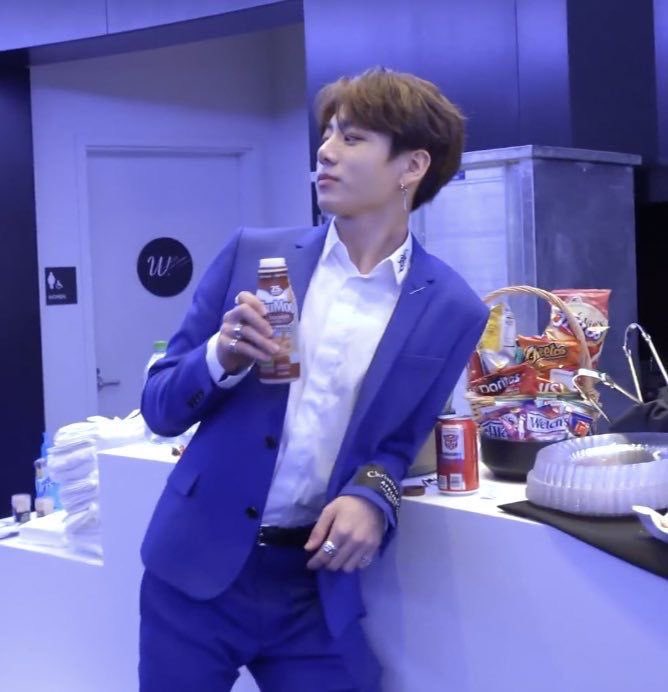 The power of Jimin in his red suit was on full display on 09/13/18 on America’s Got Talent...  @BTS_twt in Dior suits performing Idol & JK looking like “international playboy” drinking chocolate milk BH said “no performances” during the tour but...