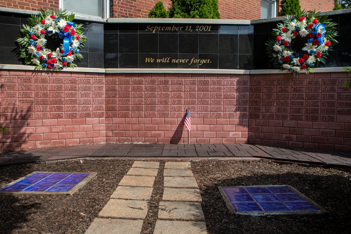 FDNY's tweet photo. FDNY members at the FDNY EMS Training Academy at Fort Totten in Queens pause to remember those who made the Supreme Sacrifice 19 years ago today, as well as those who have died of illness related to their work in the World Trade Center rescue and recovery efforts #NeverForget https://t.co/TyBBghLTo5