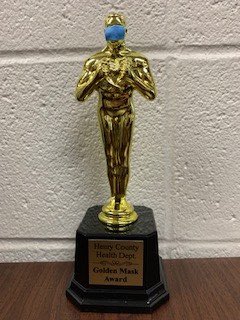 iustevens's tweet photo. 🎉🎉🎉 Thanks Henry Co Health Dept for the Golden Mask award! We will cont to do our best to keep students safe! #shscpride for our Tri Elem. staff, students & families! #WeAreTriTitans https://t.co/HuGVfZWfwk