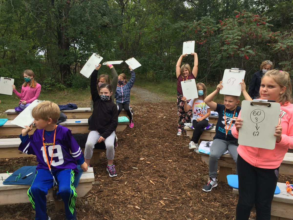 pollardclass477's tweet photo. Math class-place value lesson  today outside on the school forest benches. https://t.co/sTLhri7Mci