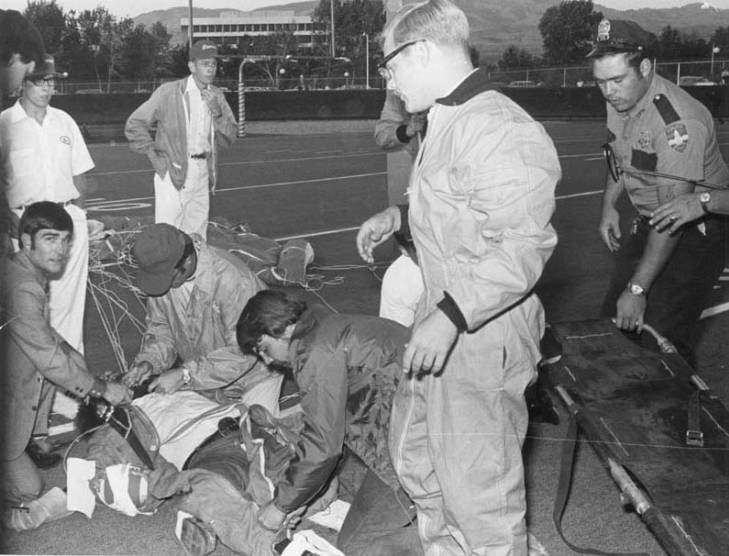 The BSC skydiving club (!) was part of the pregame entertainment. Club president Wally Benton carried the game ball, but a crosswind on his final turn sent him sideways. He crashed onto the field, suffering compound fractures in both legs and a head injury.