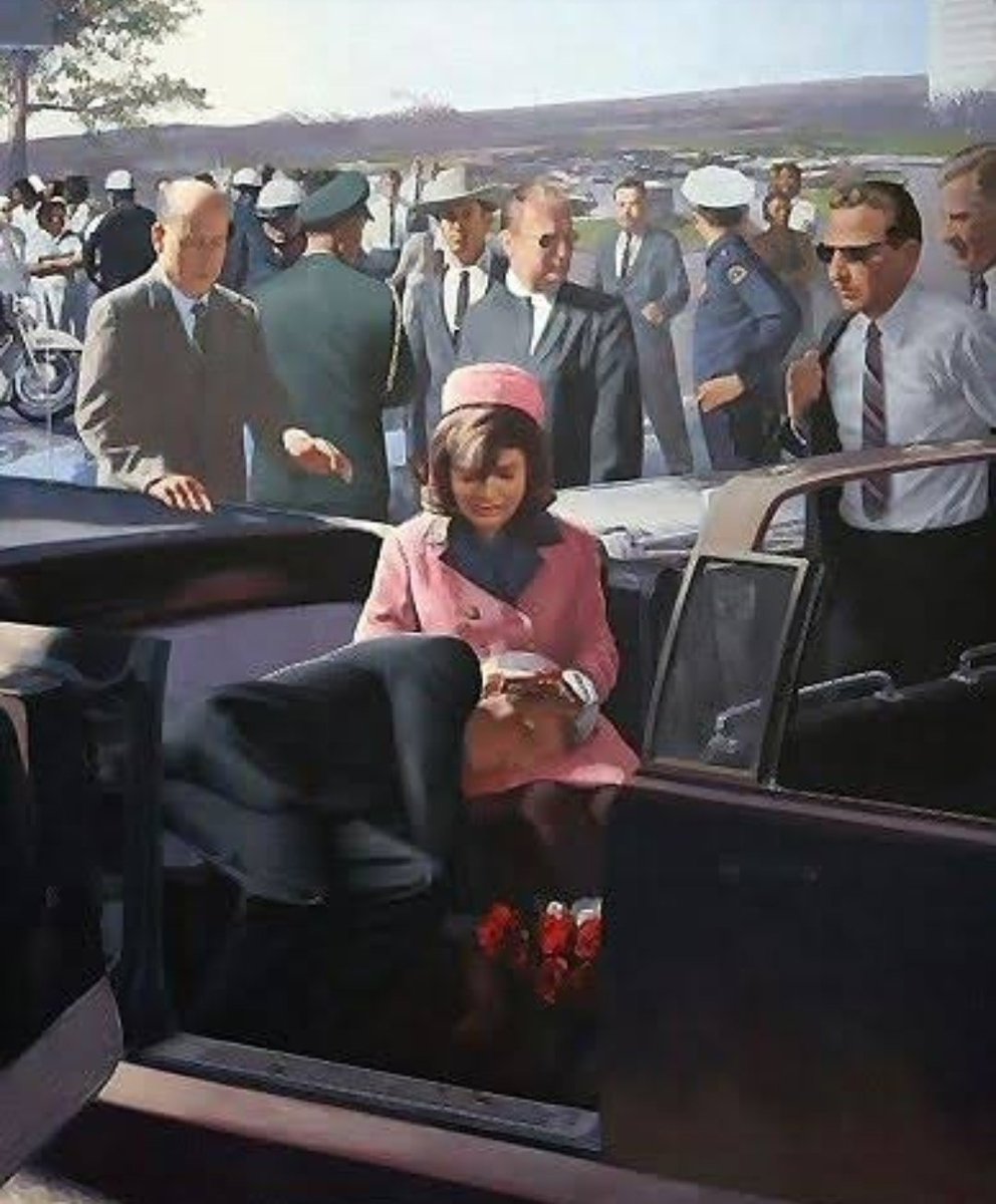 as he rode in a motorcade through Dealey Plaza in downtown Dallas, Texas. Bullets struck the president's neck and head and he slumped over toward Mrs Kennedy. The governor was shot in his back.The car sped off to Parkland Memorial Hospital just a few minutes away and at 1:00p.m.