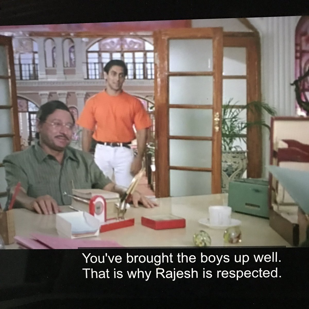 Men talk now—But Sanskari Uncle (guardian) has brought up Prem and Rajesh with lots of sanskaar. So now there’s a secret alliance talk because there’s a sanskari seedhi saadhi girl with a sweet temperament who is perfect for Rajesh.