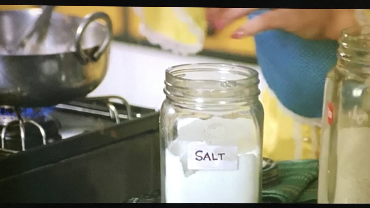 Salt. Rita so stupid that she can’t see SALT written on the jar. Ofcourse if she could cook well then Prem would’ve had a hard time choosing between Rita and Nisha. What luck!