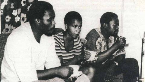 Steve Biko during the years of banishment to the King William's Town district. He is at Zanempilo Clinic (one of the Black Community Programs) with Dr Mamphela Ramphele and Mxolisi Mvovo. This is in 1975.