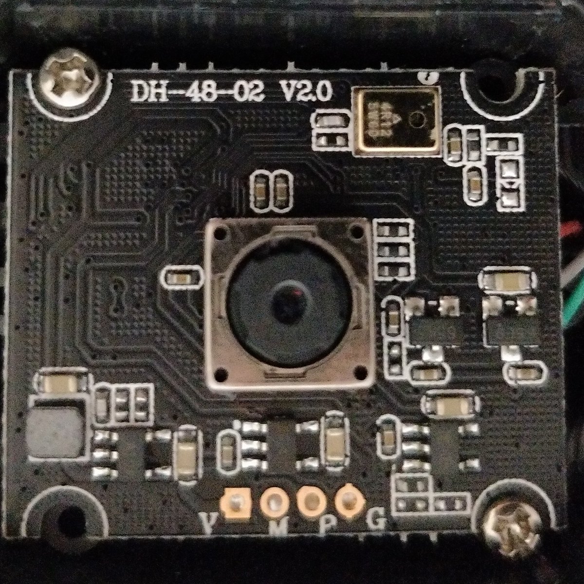 ZOOM! ENHANCE!Here's a close up of the PCB.DH-48-02 V2.0No markings on a camera module.I assume the mic is the bottom left component labelled 4R12 5WGD (or possibly 5WCD).