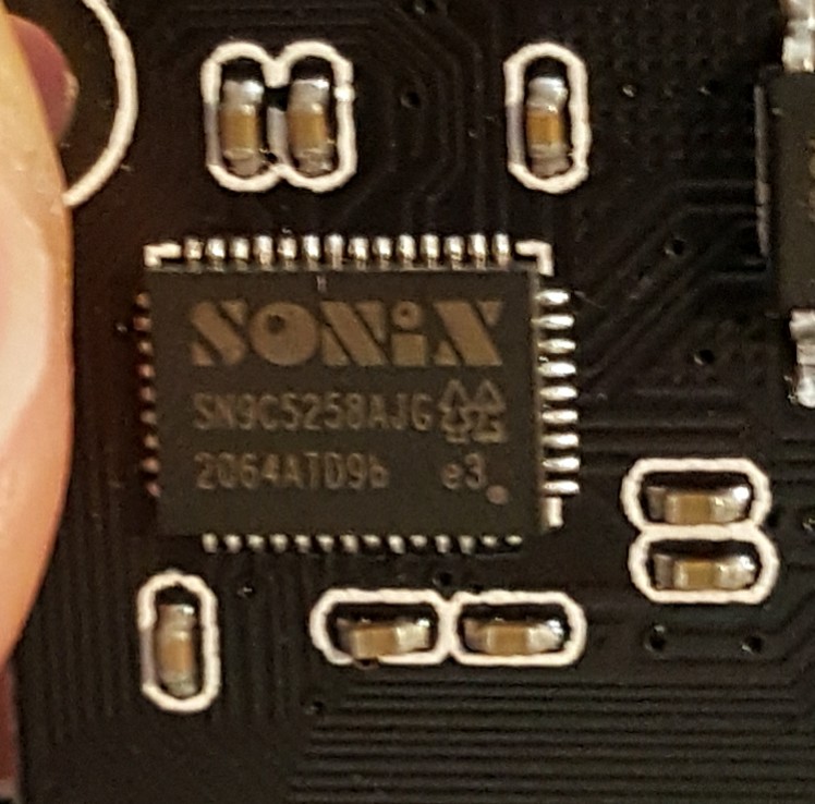 As reported under Linux, it's a Sonix.SN9C5256AJGWeirdly, I can't find a datasheet for it.