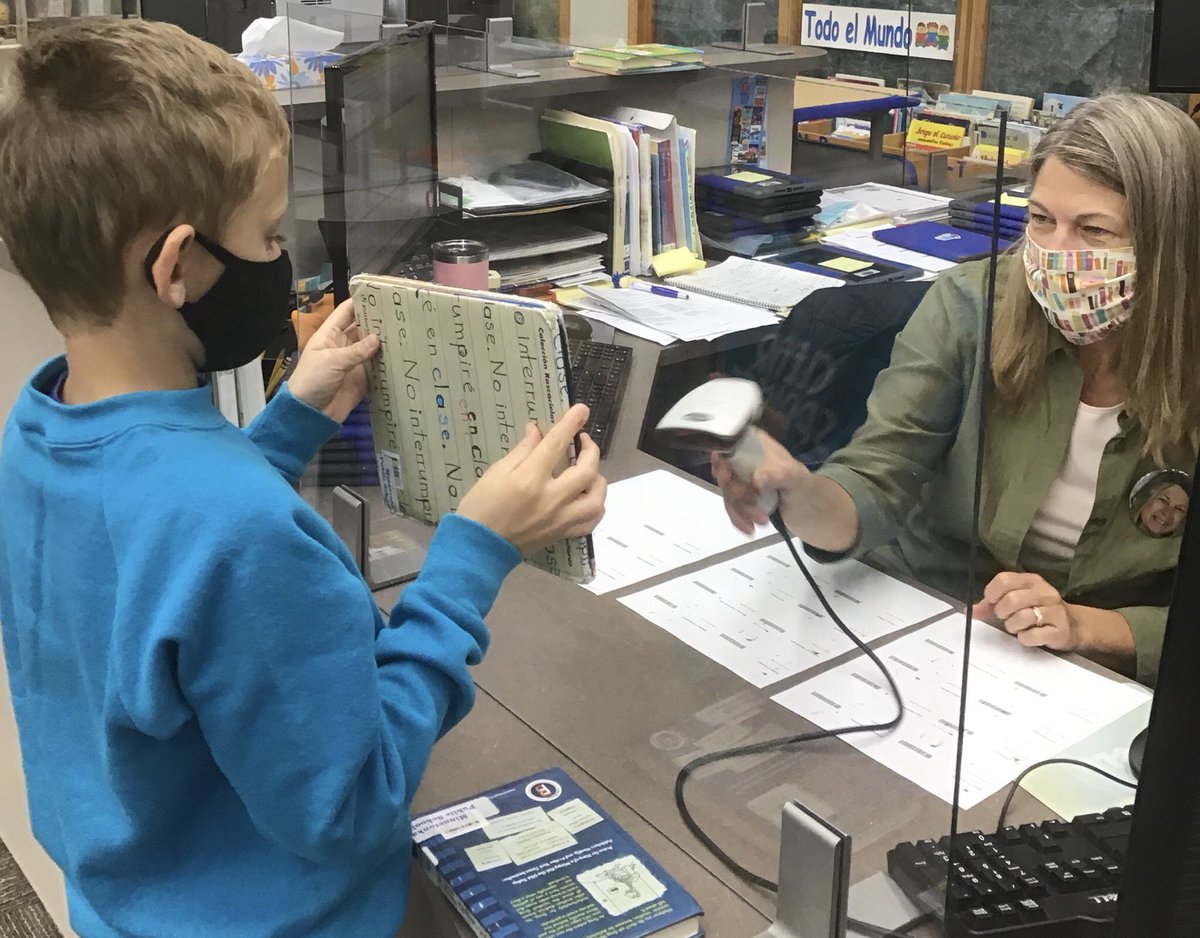 Miley_Media's tweet photo. First wk of touchless book check out was a success! Feels awesome getting bks into the hands of ss again! #CSEtonka @TonkaSchools https://t.co/jmD2uA1ADL