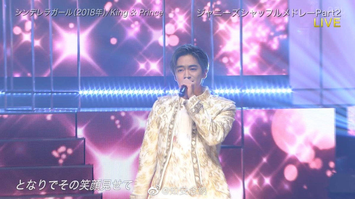 Silver haired Chinen in their white princely costume 