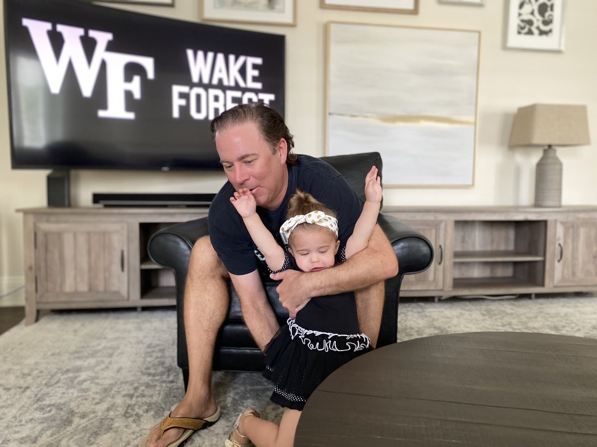 WEARAllenStrum's tweet photo. It’s #WFGameday so baby girl and I are fired up. Here’s the morning photo shoot. #GoDeacs 🎩💛🖤
#toddler #girldad https://t.co/ZgOFzxVWWe