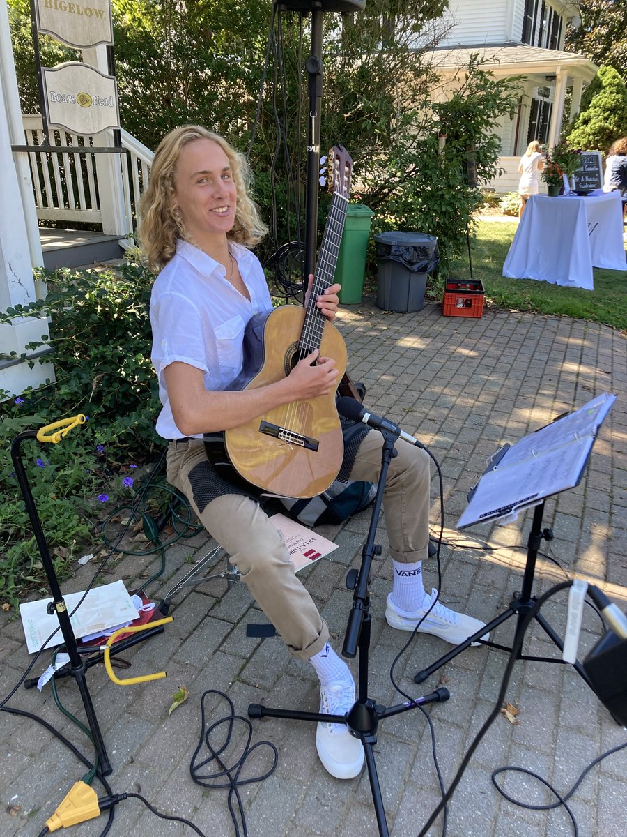RHAM_Music's tweet photo. A gorgeous Saturday to “Tip a Musician” in support of Project Graduation. Proud of our Raptor Music guitar soloist! https://t.co/5LzkzFyXry
