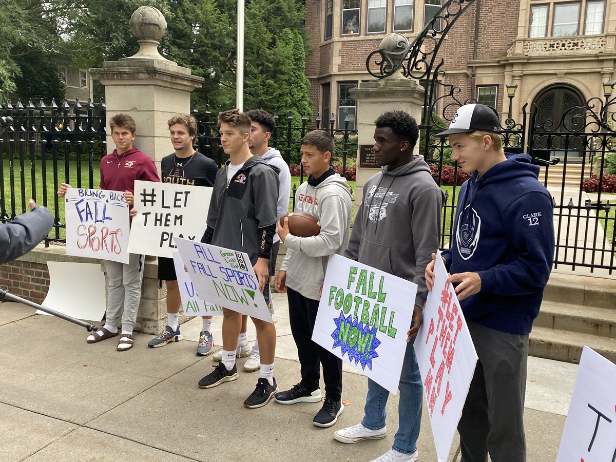 david_schuman's tweet photo. High school football players and parents protesting outside Governor’s Mansion. They want to play football games this fall. Big concern with playing in spring is frozen fields. More at 6 and 10 @WCCO https://t.co/EKaK4wMox1