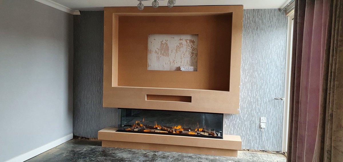 Firesurrounds's tweet photo. Another media wall fitted with the @Evonicfires e1800. Our made to measure breasts are made in our factory. All done installed no mess in less than 4 hours. https://t.co/ldu8eyxsDJ