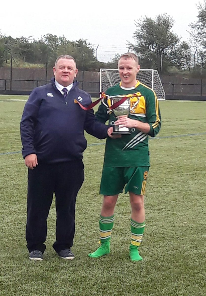 Club captain Shane Mc Cullagh receiving the Division 2 Trophy from Enda Love

 Looking forward to Division 1 this season #MFC