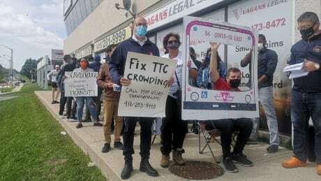 CBCToronto's tweet photo. Protesters create 'COVID-19 East' bus to focus attention on TTC crowding https://t.co/BvDD3fBEDS https://t.co/NPwQ54BvoF