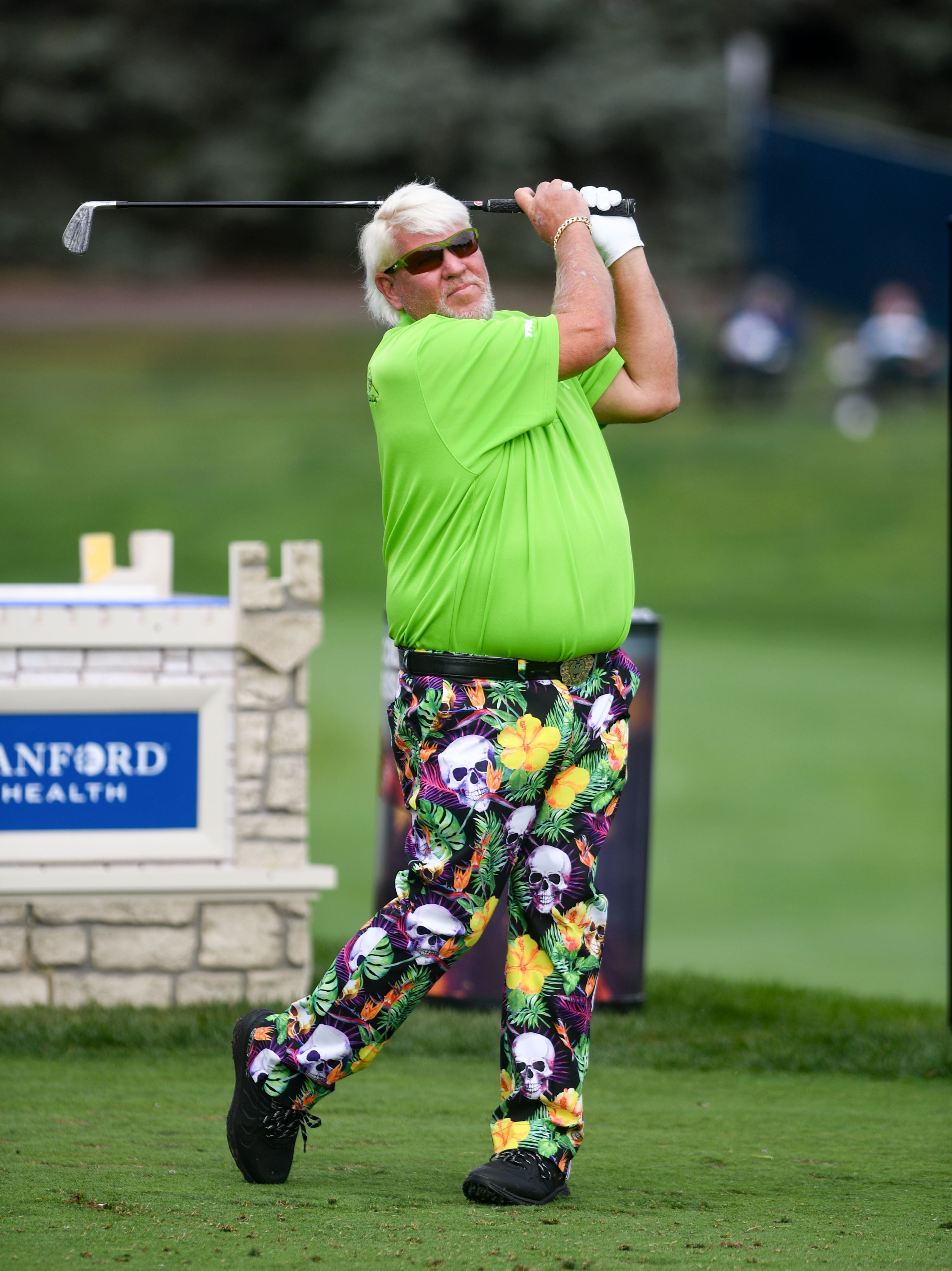 Erin Woodiel on X: John Daly outfit of the day - jungle skull pants with  lion belt buckle and glowing green shirt. @SanfordIntl   / X