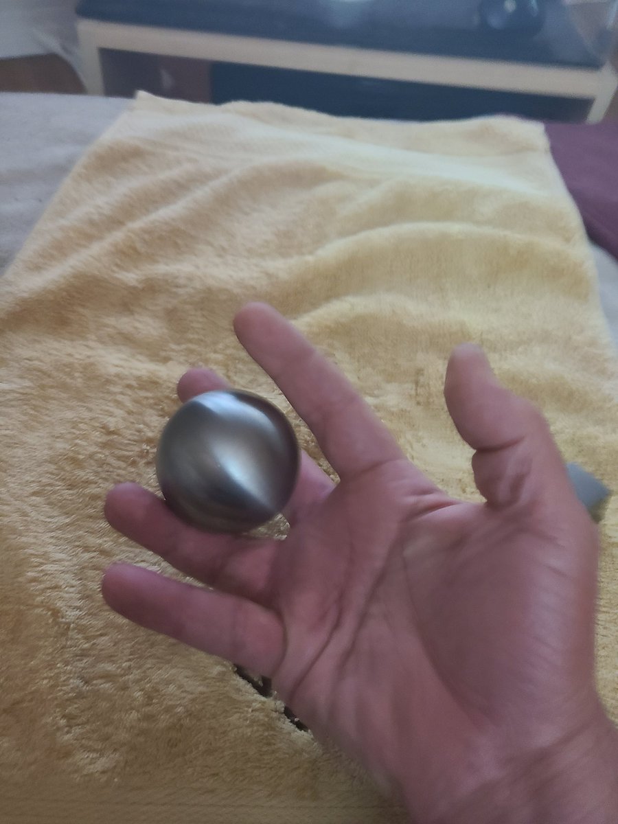 that way while they are still too hot to touch directly.So, why two different objects?The larger sphere is to build strength and provide a challenge to my hand:
