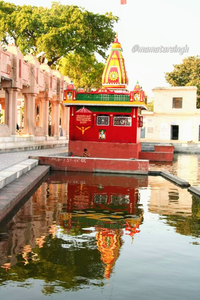 bank through small concrete arch bridgeINTERESTING FACTS:1. It is believed that god Brahma used to worship god Shiva here. He created this sarovar & after performing yagna he went on to create universe from this sacred land2. It is said that during battle of Mahabharata..2/6