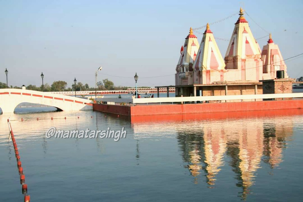 bank through small concrete arch bridgeINTERESTING FACTS:1. It is believed that god Brahma used to worship god Shiva here. He created this sarovar & after performing yagna he went on to create universe from this sacred land2. It is said that during battle of Mahabharata..2/6