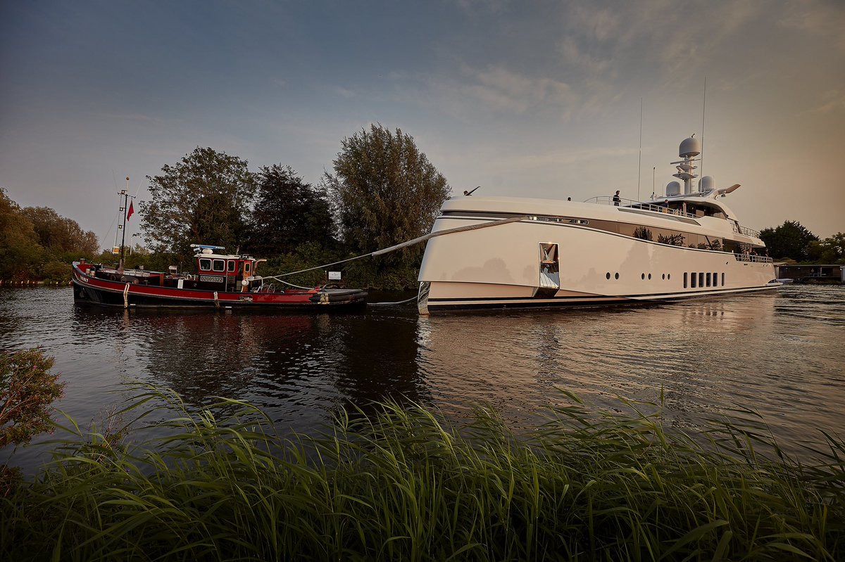 Feadship's tweet image. It’s come and go at #Feadship: just when Feadship #Project706 exited the construction yard in Aalsmeer, Feadship #PI (ex Syzygy 818) was on her way to our #Amsterdam yard for some premium quality maintenance work. Next stop for Project 706 will be her sea trials. Stay tuned!
