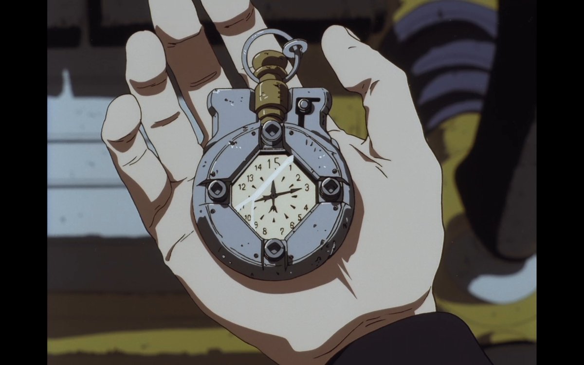 Jet black is carrying weight. the weight of the past that is. Besides being sold out by his fellow men as a cop and because of that losing his arm. he also had a broken relationship where his wife left him and his heart went numb and time stopped for him just like that watch.