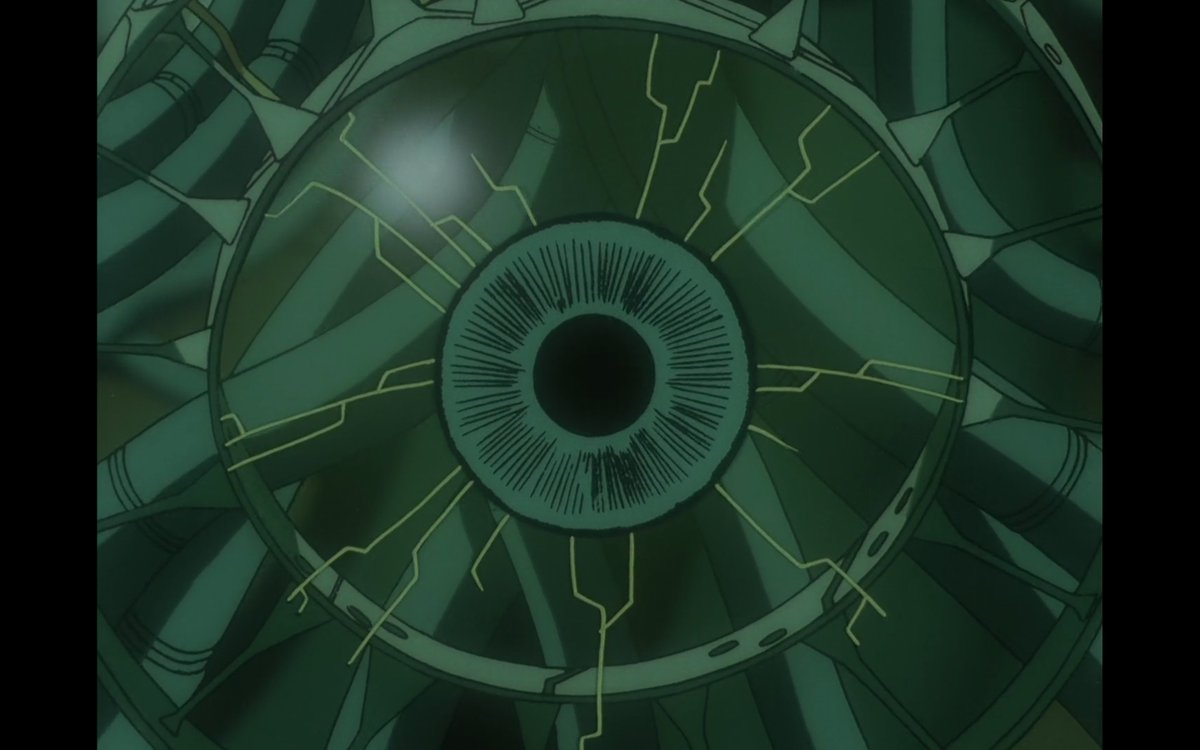 One of the things we also find out is that one of his eyes is not actually real and is a slighter lighter then his other real eye. He says his real eye says the real world. The present. the now. His right fake eye sees the past. A past he can because of the not rid himself of.