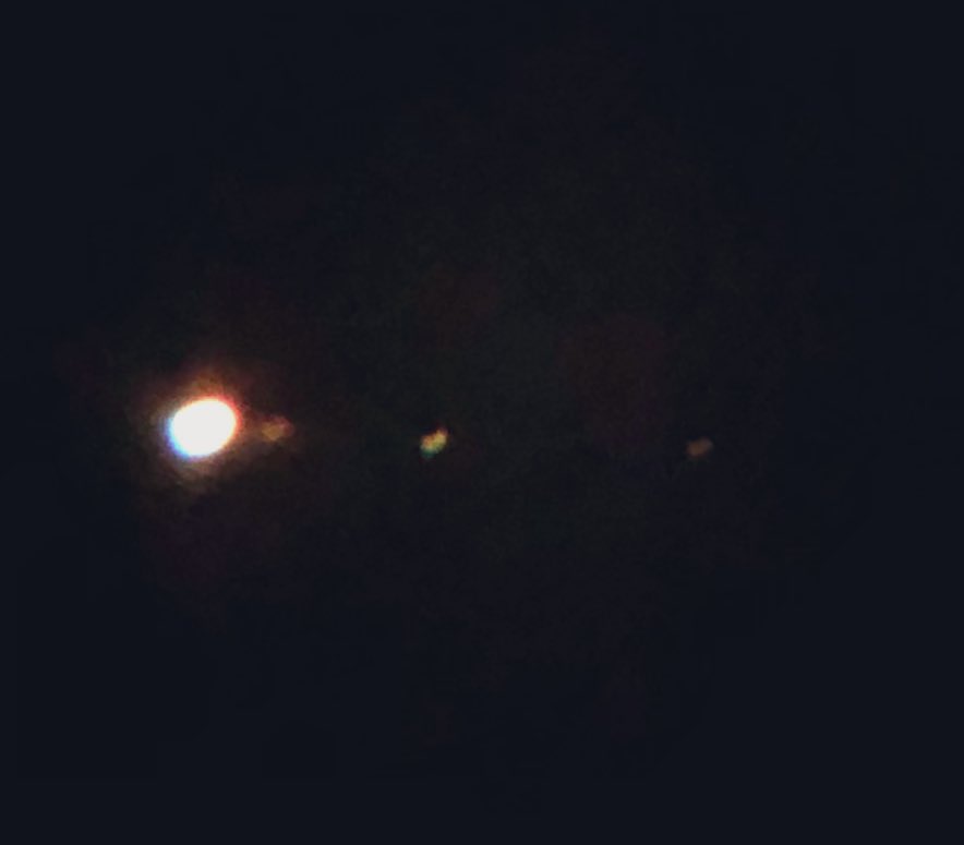 FestHoof's tweet photo. Up at my sister in the Lake District and bought my telescope up, got this shaky pic of #Jupiter through the eye piece via my phone. You can see Jupiter on the left and 3 of its moons to the right (3rd is very hard to make out )

#space #moonsofjupiter #solarsystem #spacenerd https://t.co/t2JZjewgGx