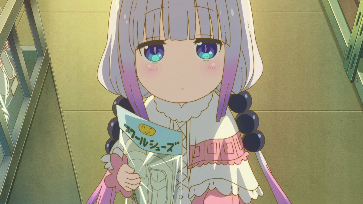 Kanna grabs Kobayashi. I think Kanna is looking for reassurance that's everything is going to be okay. She's also very perceptive, maybe thinking that Kobayashi went through some experience where she felt alienated and thus Kanna offered to comfort her! Either way, cute scene!