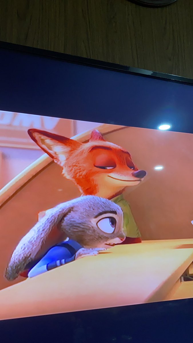 WHY IS HE SMIRKING LIKE THAT:)£:&;&:&: OH TO BE OFFICER HOPPS