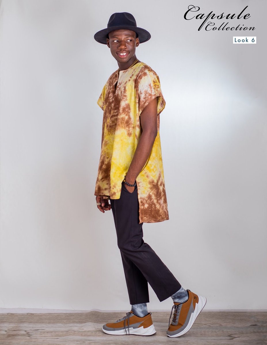 This is how you Turn up to that hangout with friends when the dress code is INDIGENOUS BUT WITH A LITTLE EXTRA FUNK! I know right!!We have our model in a beautifully colored brown and yellow adire danshiki with assymetric bottom!! What’s not to love !! #adire  #danshiki