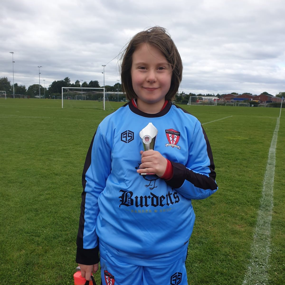 Well done to all the players for a great friendly against <a href="/sbachutdgirls/">Sandbach United FC Girls Section</a> U13's today. Player of the Match goes to Tilly who made a superb effort in goal 🏆 Here she is in the brilliant new goalkeeper's kit, sponsored by <a href="/burdettsbarbers/">Burdett's BarberShop</a> and Little Munchkins Nursery 🙌🏻