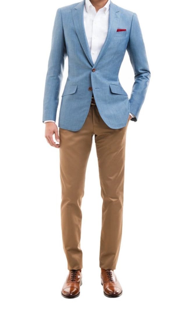 Man In Beige Pants And A Blue Blazer Stock Photo By zakharovaleksey  96007298  lupongovph