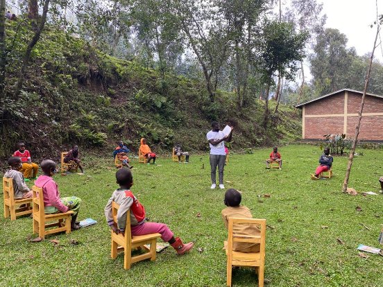 rwandopp's tweet photo. Curious to know what our afternoon looked like? It was full of books and stories and all the fun that comes with these. Happy for the visit of @Innocentrw  the founder of @image_rw , who also read a storybook for our young readers! #RwOT https://t.co/wGKKlVoiPh