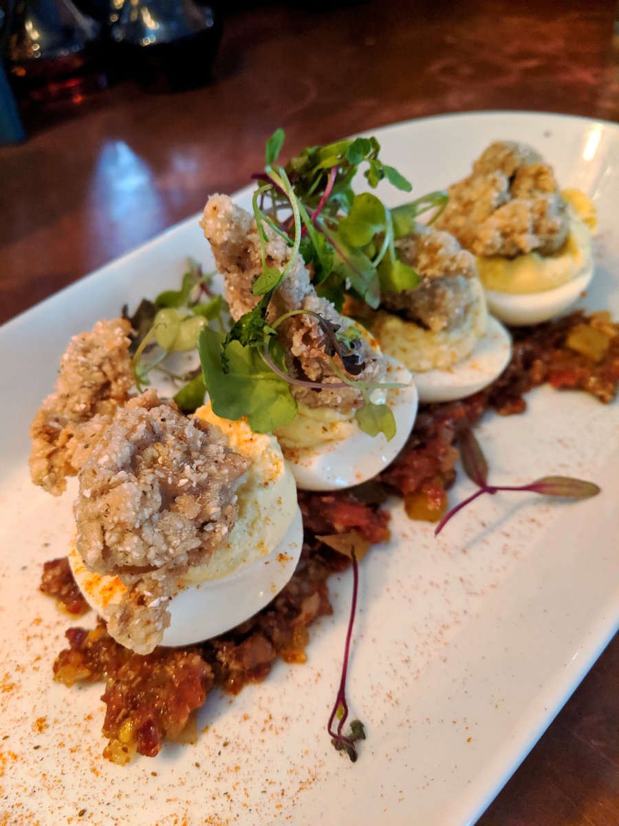 YellowHybiscus's tweet photo. You've never had deviled eggs quite like this. Deviled Egg BLT w/ Southern Fried Oyster.  This comes with crispy corn fried oysters, housemade tomato-bacon jam and local micro greens. You can enjoy this @freshcatch27.
.⁣
#freshcatch27 #staug #staugustine #visitstaugustine https://t.co/GaRTkuvBSr