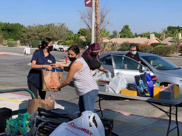 DesertSandsUSD's tweet photo. School supply drive happening now at LQHS! Drive through drop-off until noon. #LQPSA senior and project lead Alyssa Torres thanks the community for all of the support for her elementary school! #DSUSDpride https://t.co/LfG9SYSZaz