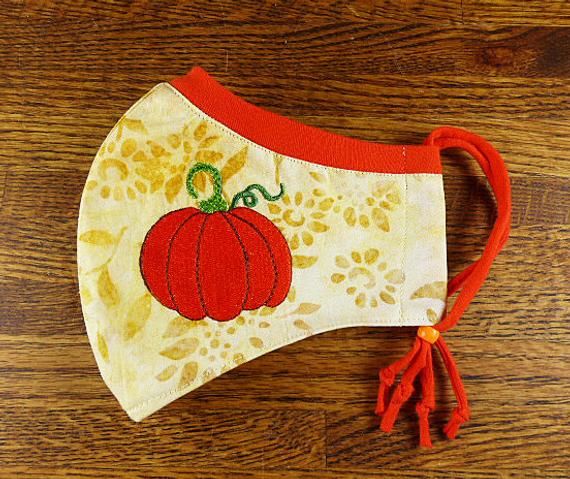 SantaFeKiss's tweet photo. Embroidered, Washable, 3 layer face mask w Stretchy nose band to help eliminate fogging of glasses w Filter pocket / Handcrafted in the USA #fallfacemask https://t.co/vLPc4Pon48 via @Etsy https://t.co/GWsespHtuI