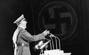 It's not a coincidence that the swastika and idolatry of the Third Reich was so ubiquitous. Fascism and Nazism became nationalist, political religions and the expression of identity through the symbols (think MAGA hats, Trump flags) became like displays of crosses.13/