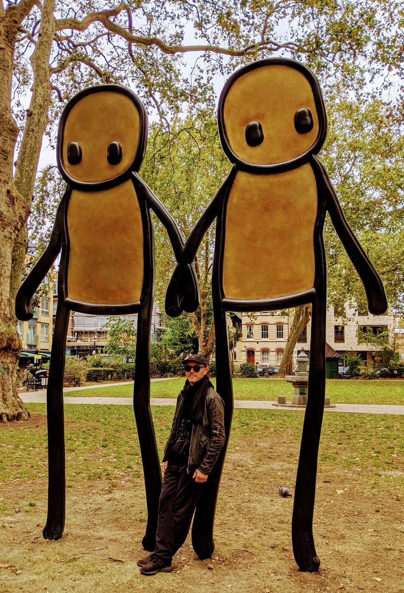 Me &amp; my mate Stik in Hoxton Square. He is the artisr  who created this sculpture.