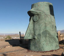 Artist Gregg Arnold’s "Gigantus Headicus” would fit in on Easter Island, but it’s found 15 miles east of Kingman. 
ow.ly/VogV50BveVE
