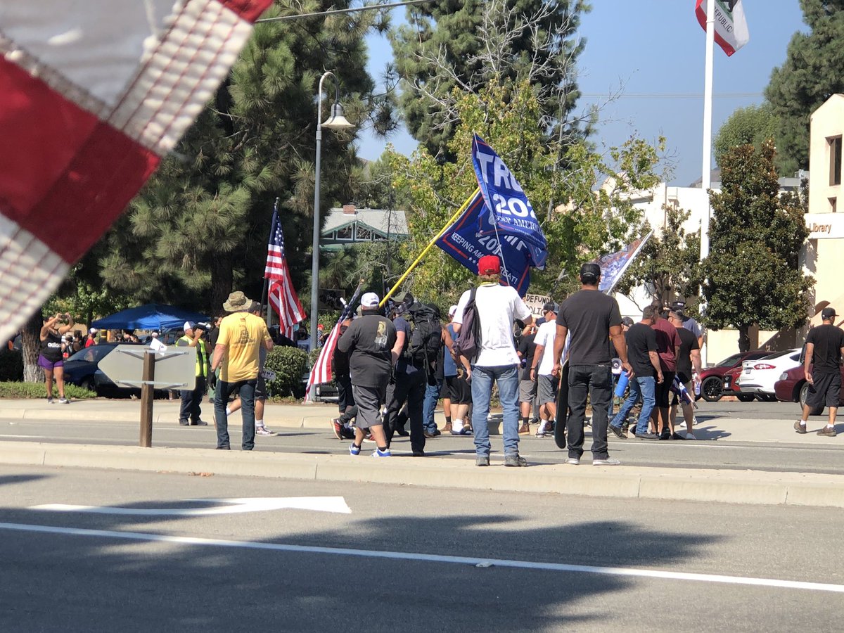 The counter-protesters call BLM protesters criminals, yet it is the counter-protesters who are breaking the law today by jaywalking across Imperial Highway to engage the BLM people. The police arrived to break things up.