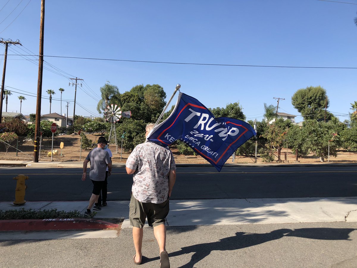 At 4:05 p.m. the helicopter have another five-minute dispersal order. I saw a few stragglers sling their flags and banners over their shoulders and walk away.