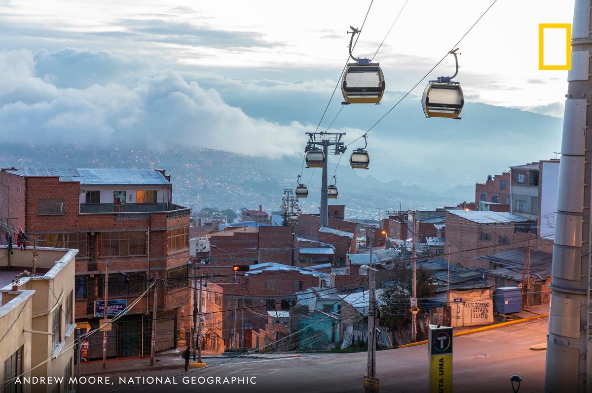 NatGeoTravel's tweet photo. Clouds roll over the city of La Paz, Bolivia in this captivating image by photographer Andrew Moore. https://t.co/CQh1dQ1KdI