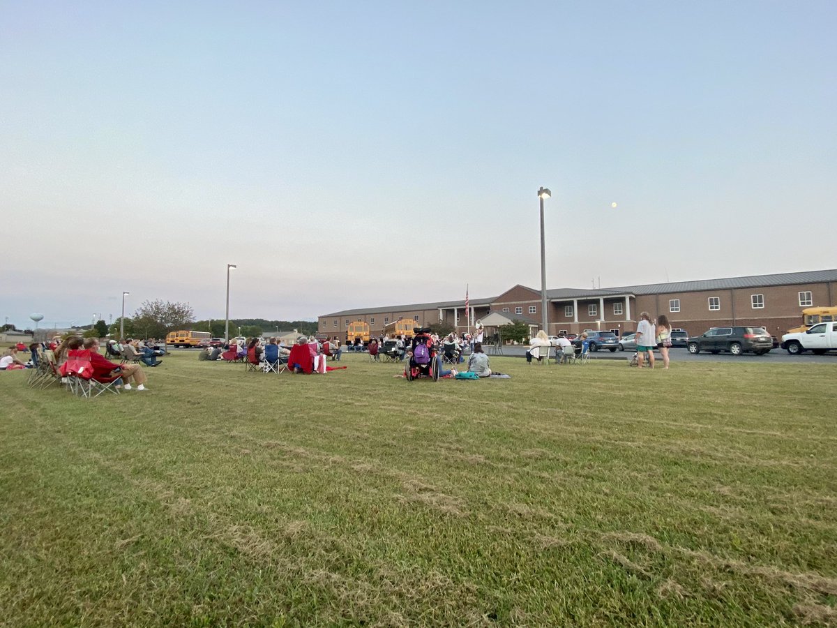 MrsABurkitt's tweet photo. Lovely night for a socially-distanced, mask-wearing, outdoor concert by the Rockinβ Redstreaks on the front lawn of PHS. And since we were on our way home from our walk, Stinky experienced his first concert ever. He gave it 2 enthusiastic paws up πΎ #PiketonPride #BandGeekForLife https://t.co/SYjidYwtag