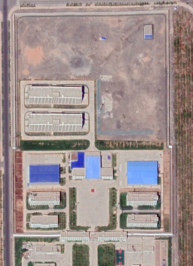 It is also directly next door to a much less ambiguous detention facility, that  @ChengxinPan also must have seen but made no mention of. That's not proof in and of itself, but we do know often detention camps are built in complexes of 2 or 3 (in this case 3) facilities.